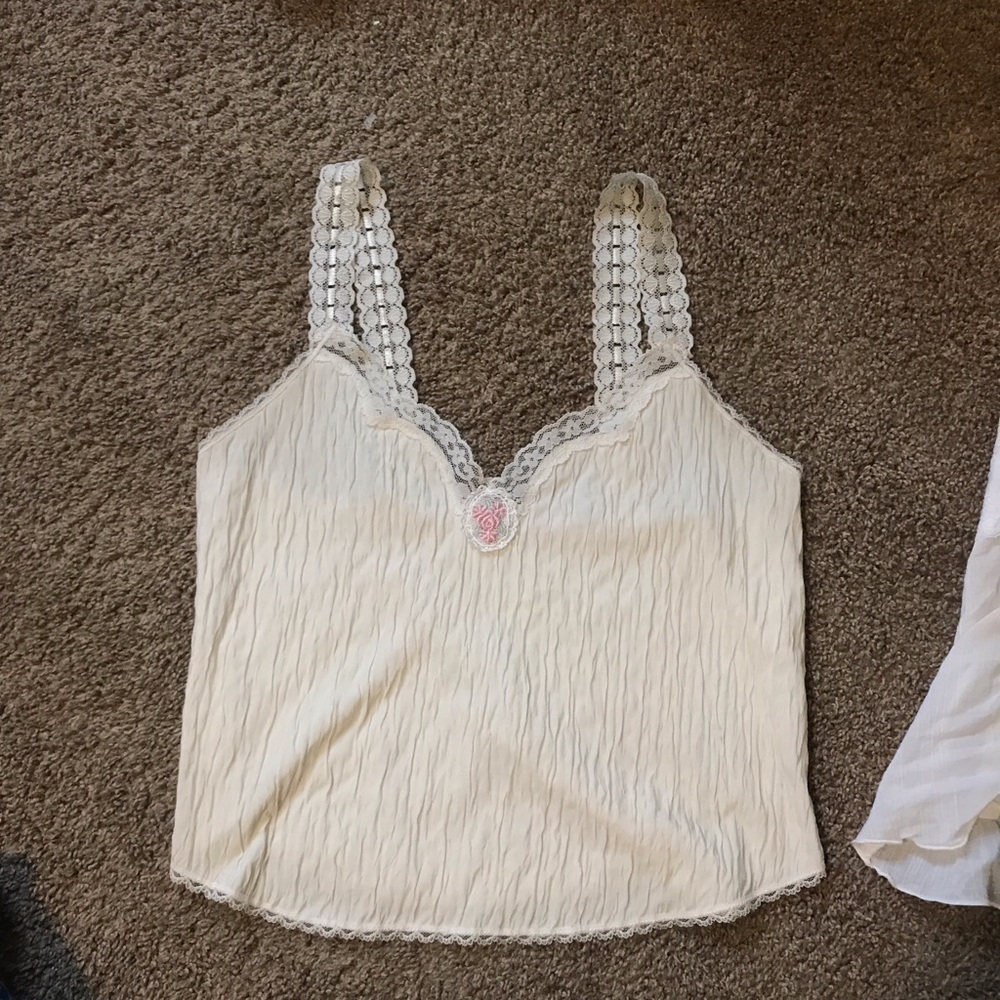 “Sleep Solations” White silky top (1) $13. “A.BYER” White flowy lace top (2) $13